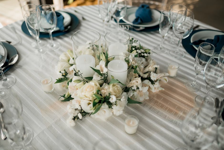 Stoff Nagel chrome candle holder system arranged on a table