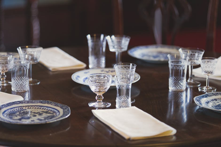 Matte white stoneware dinner plate on a linen table setting