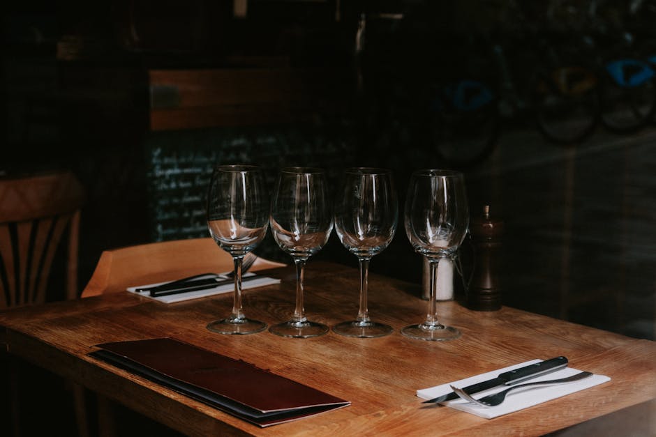 Red wine glasses on a set table